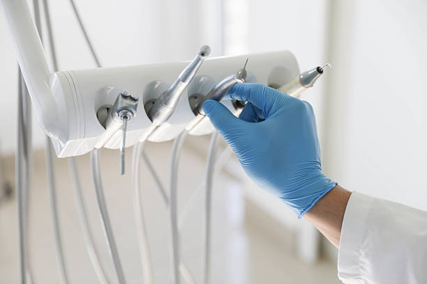 Professional Tooth Extraction technician working in Raton, NM